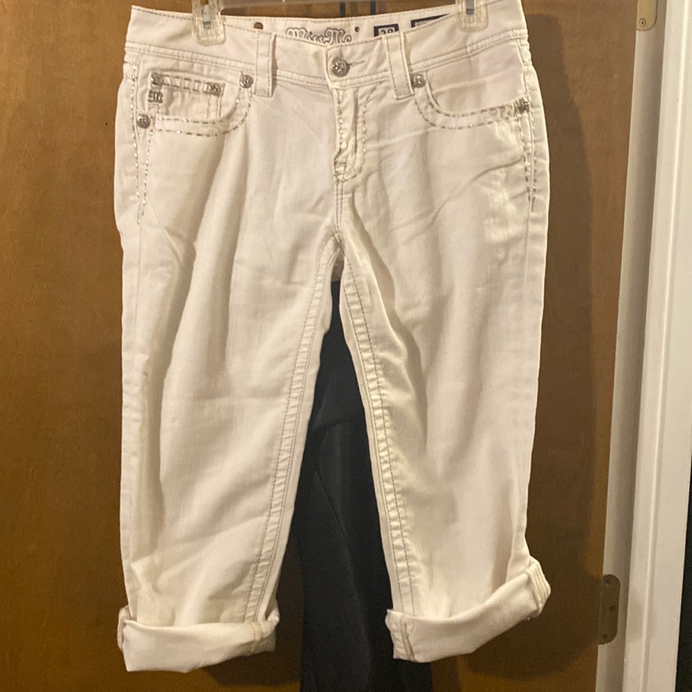 White Miss me capri w silver embellishments.